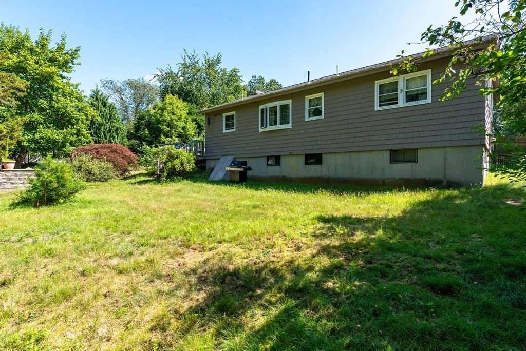 126 Baldwin Road Billerica, MA 01821 - Photo 27 of 30 a view of a house with a yard