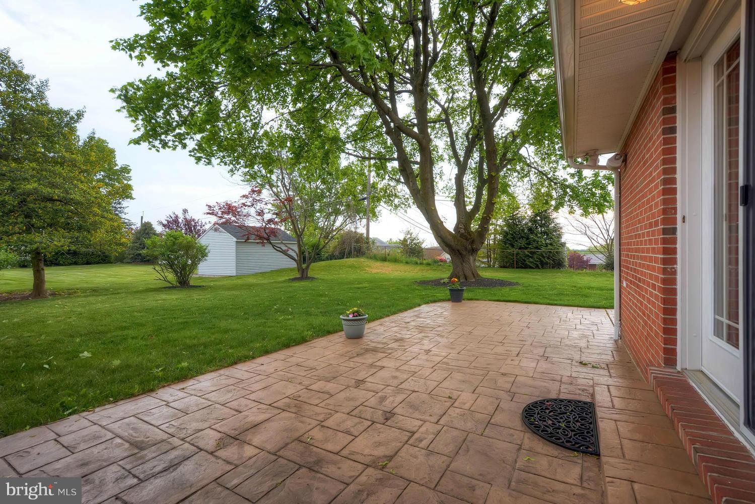4103 Kahlston Road Baltimore, MD 21236 - Photo 23 of 30 Rear Stamped Concrete Patio