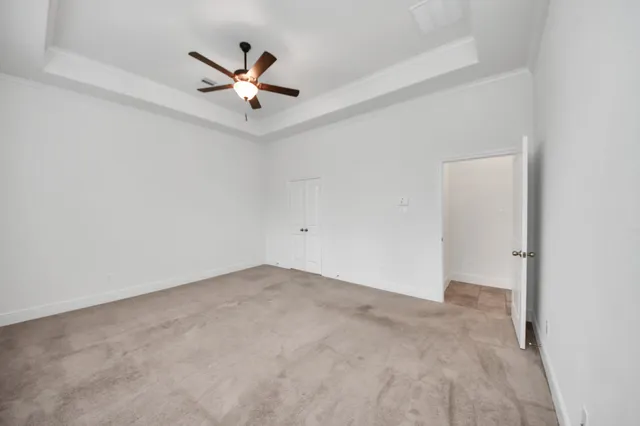 a bathroom with a sink vanity tub and a mirror