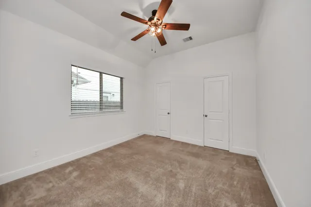 a bathroom with a sink vanity and mirror