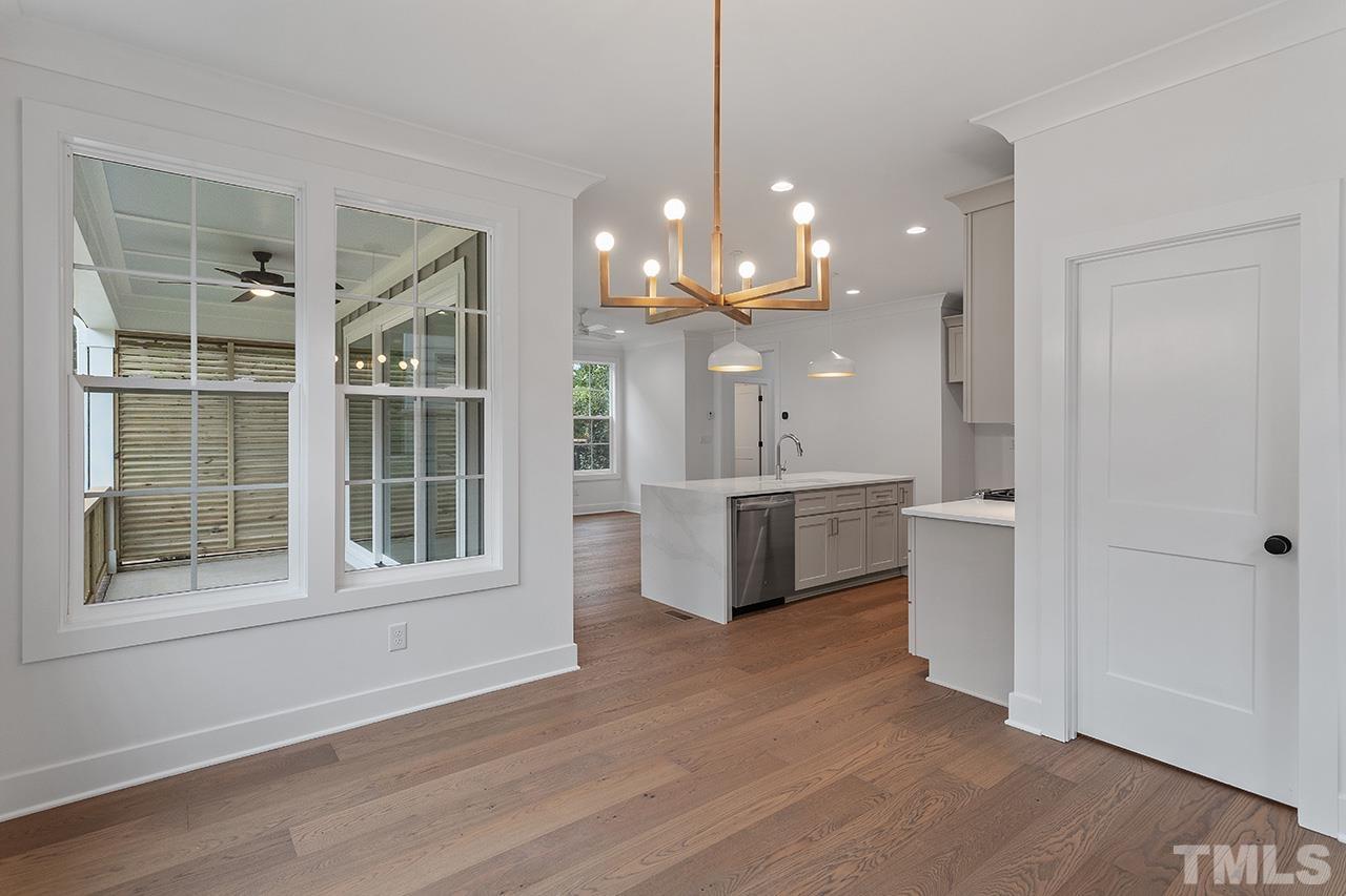6502 Brecken Pnes Court Raleigh, NC 27612 - Photo 17 of 32 a view of a kitchen and a sink