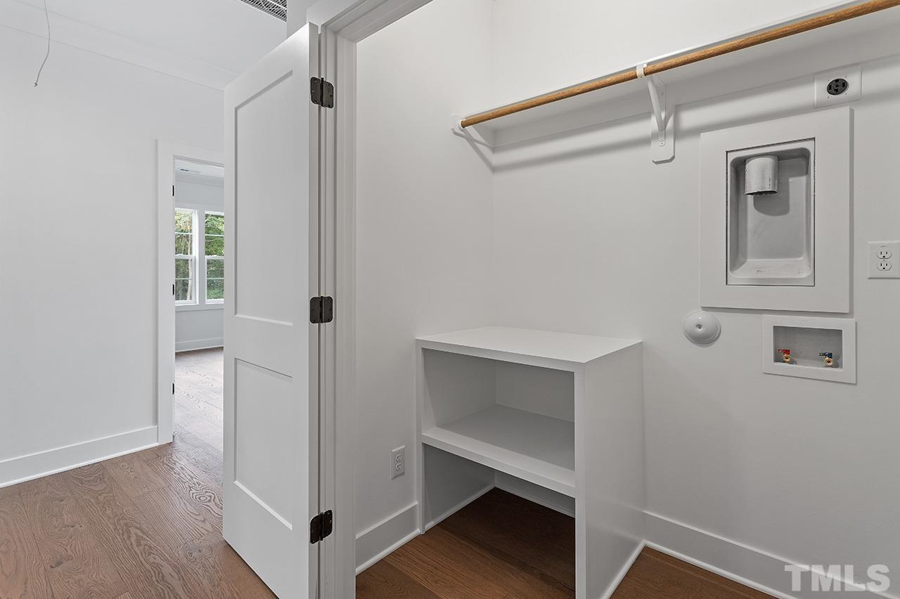 6502 Brecken Pnes Court Raleigh, NC 27612 - Photo 30 of 32 a view of an entryway with wooden floor
