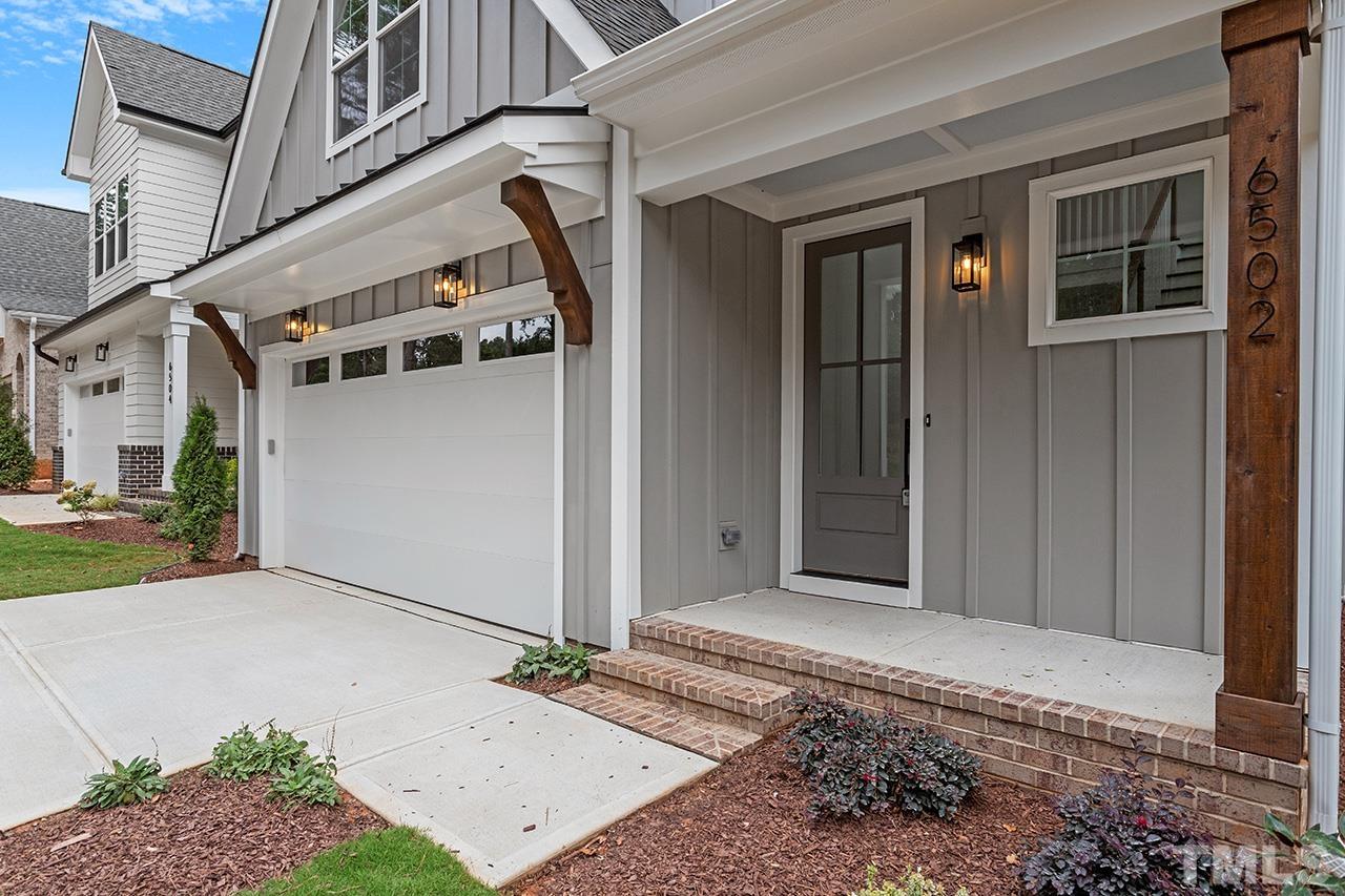 6502 Brecken Pnes Court Raleigh, NC 27612 - Photo 3 of 32 a view of a back yard of the house