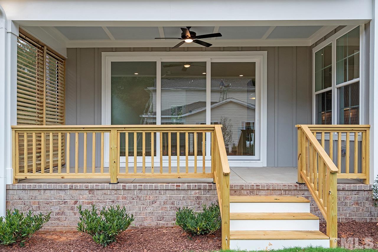 6502 Brecken Pnes Court Raleigh, NC 27612 - Photo 31 of 32 a front view of a house with a porch