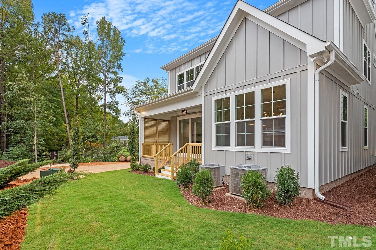 6502 Brecken Pnes Court Raleigh, NC 27612 - Photo 32 of 32 a view of house with backyard