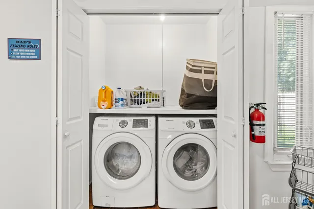 a utility room with dryer and washer
