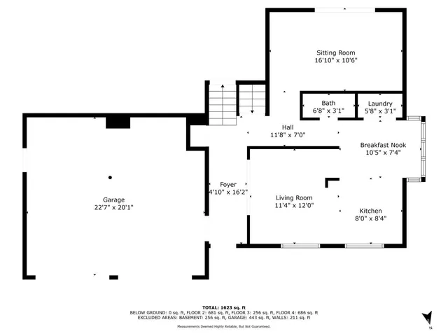 a picture of a wall with a white wall and a white wall with a black white refrigerator