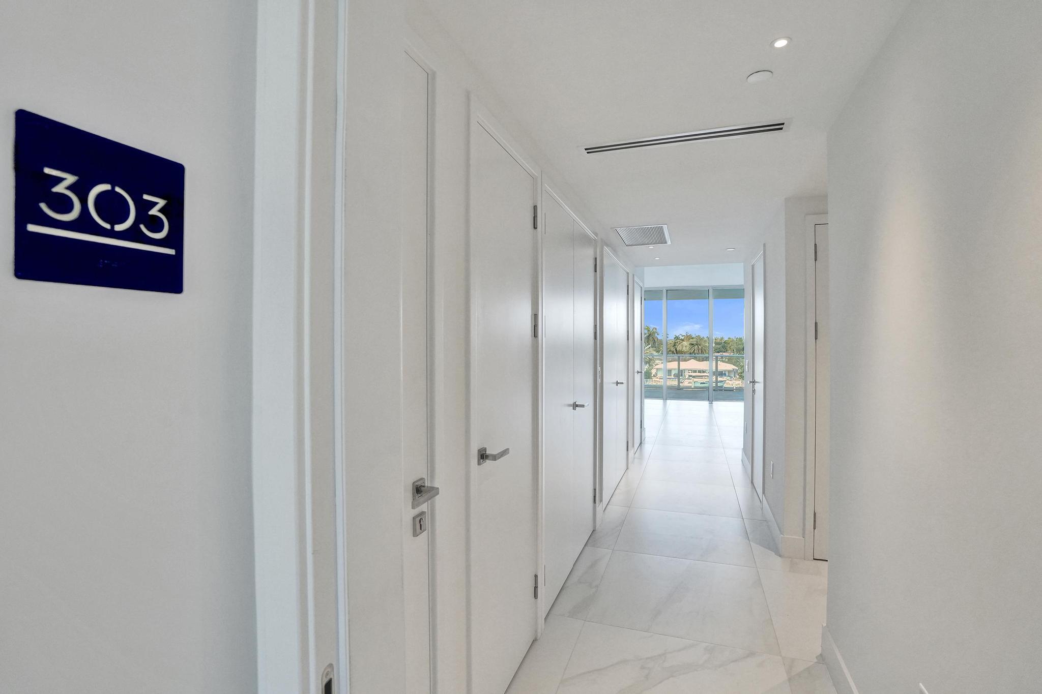 407 North Riverside Drive, Unit 303 Pompano Beach, FL 33062 - Photo 31 of 74 a view of a hallway