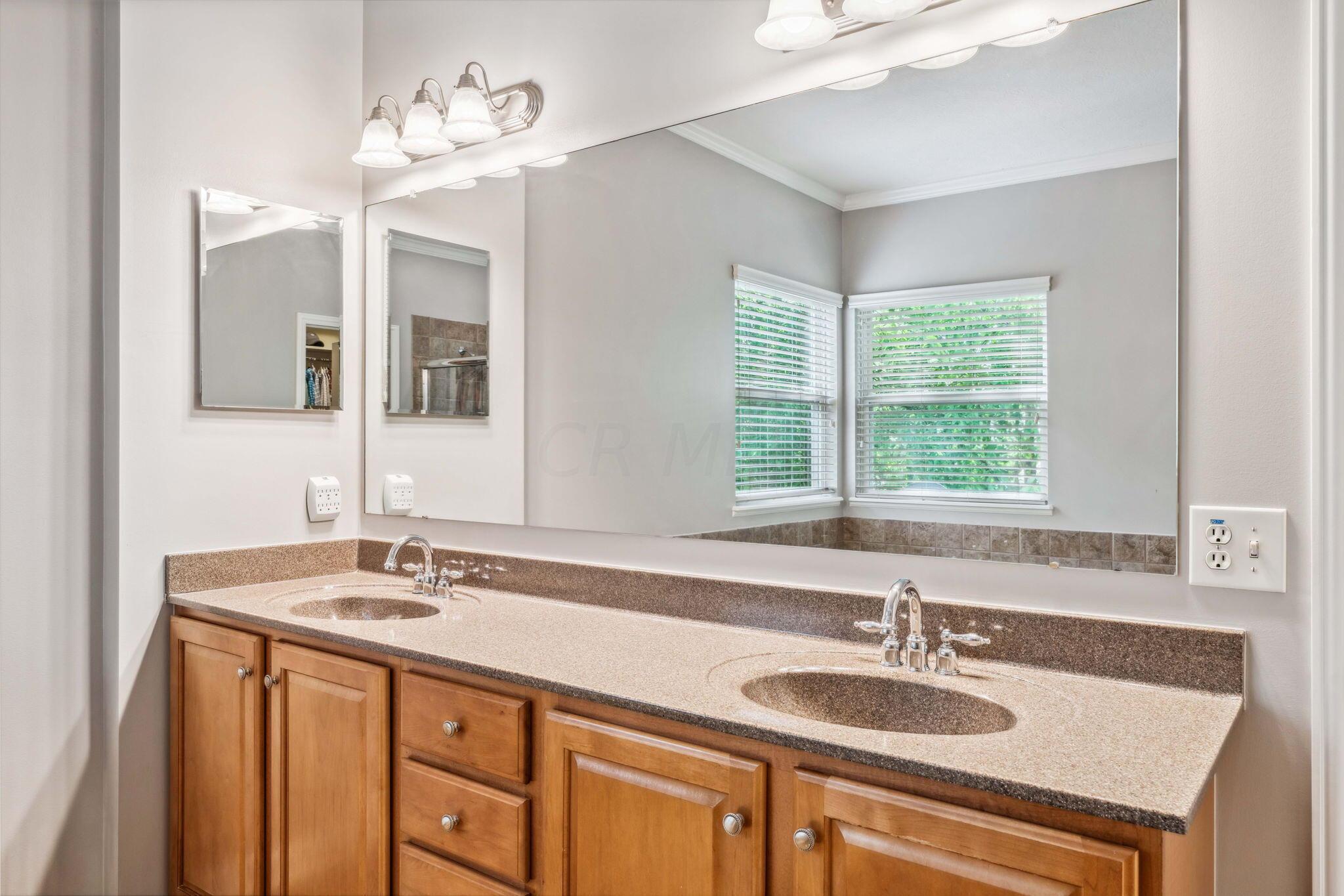 219 Smokewood Road Powell, OH 43065 - Photo 22 of 59 Double vanity, soaking tub, walk-in shower and separate water closet plus custom walk-in closet!