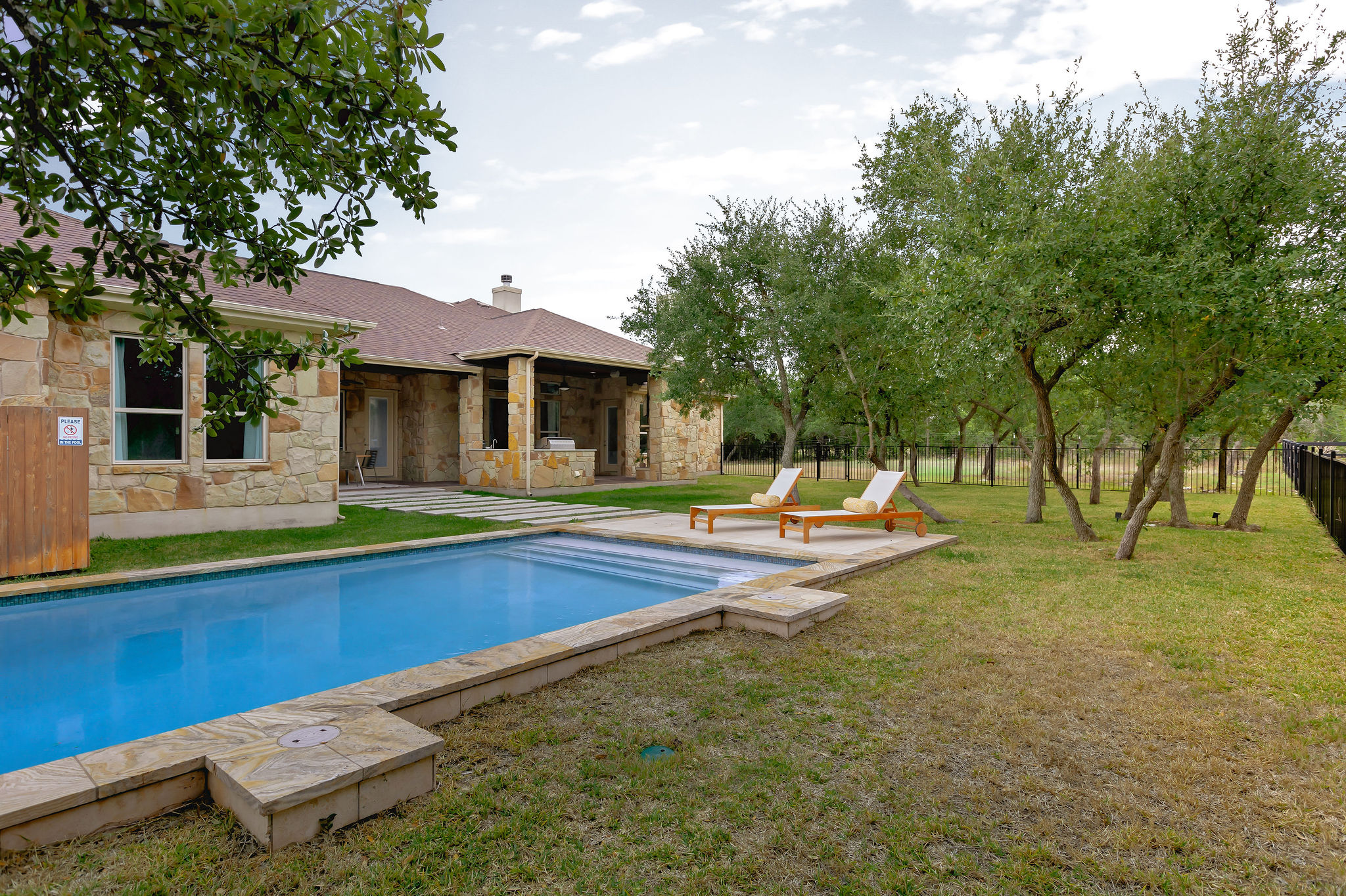 812 Jennings Branch Georgetown, TX 78633 - Photo 27 of 40 a view of a house with swimming pool and sitting area