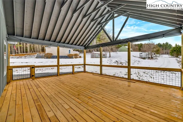 a view of porch with green space