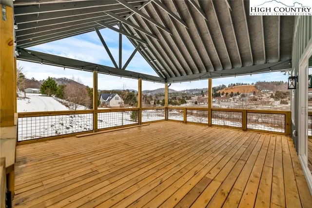 a view of swimming pool with seating space