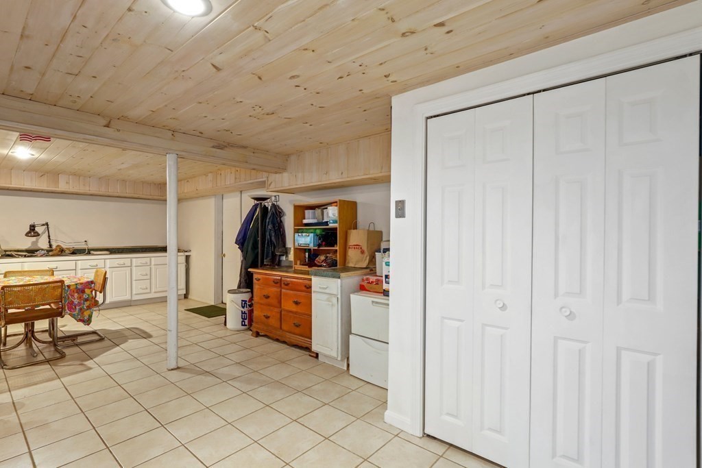 11 Easter Brook Road Lunenburg, MA 01462 - Photo 31 of 41 a kitchen with cabinets and chairs