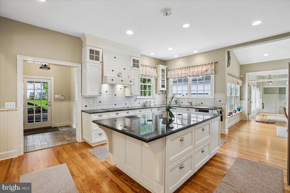 6809 Sorrel Street McLean, VA 22101 - Photo 12 of 101 a kitchen with stainless steel appliances granite countertop a sink and a stove