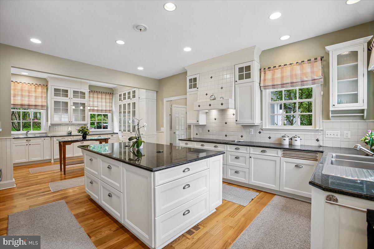 6809 Sorrel Street McLean, VA 22101 - Photo 13 of 101 a kitchen with stainless steel appliances granite countertop a sink and cabinets