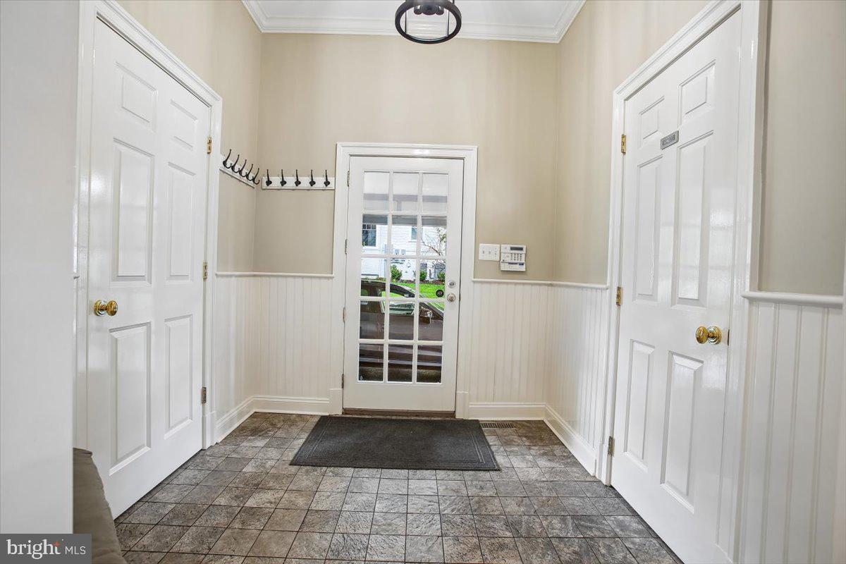 6809 Sorrel Street McLean, VA 22101 - Photo 16 of 101 Mudroom area with laundry and powder room