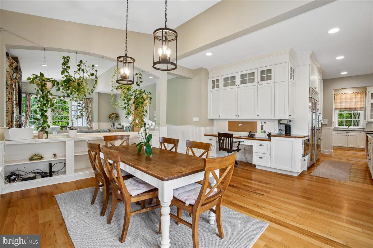6809 Sorrel Street McLean, VA 22101 - Photo 19 of 101 a view of a dining room with furniture window and wooden floor