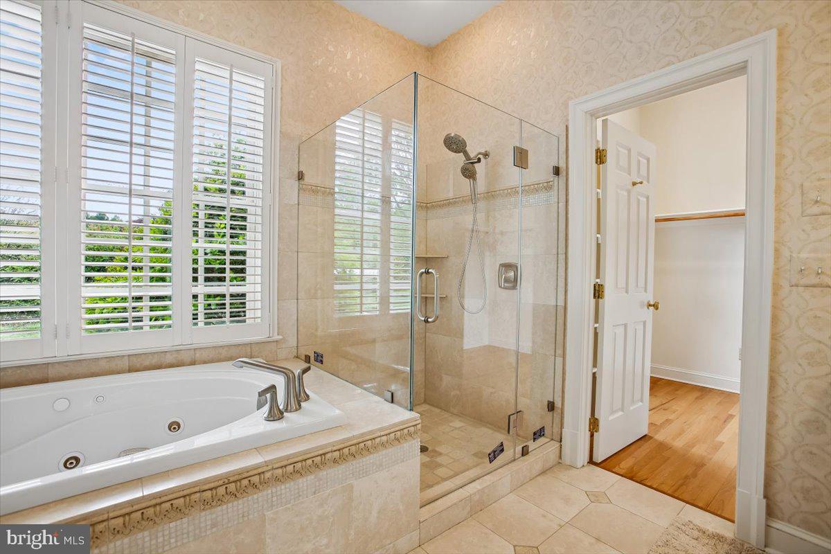 6809 Sorrel Street McLean, VA 22101 - Photo 31 of 101 a bathroom with a tub shower and sink