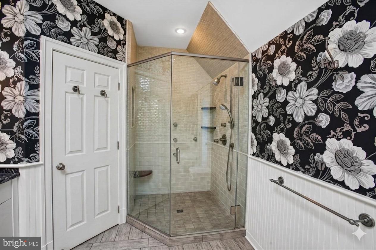 6809 Sorrel Street McLean, VA 22101 - Photo 46 of 101 a bathroom with a shower