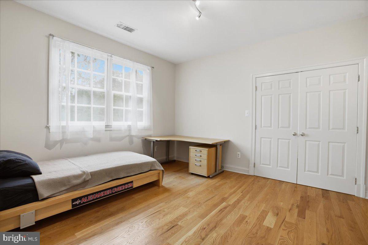 6809 Sorrel Street McLean, VA 22101 - Photo 49 of 101 a bedroom with a bed and a window