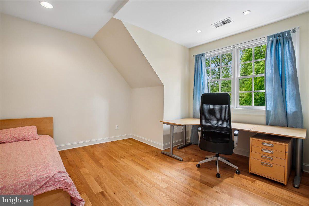 6809 Sorrel Street McLean, VA 22101 - Photo 52 of 101 a bedroom with a bed and a window