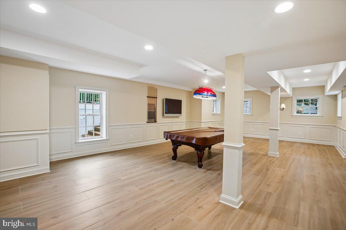 6809 Sorrel Street McLean, VA 22101 - Photo 62 of 101 a living room with furniture and a wooden floor