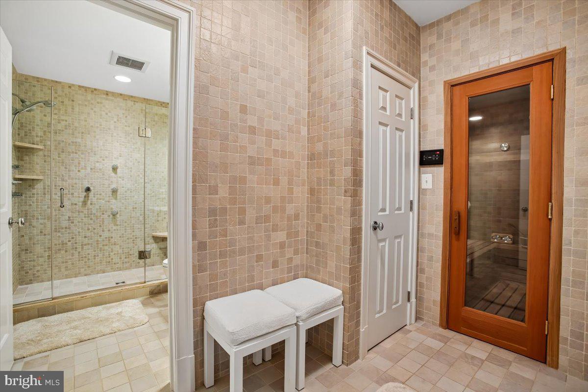 6809 Sorrel Street McLean, VA 22101 - Photo 72 of 101 a bathroom with a shower and a toilet