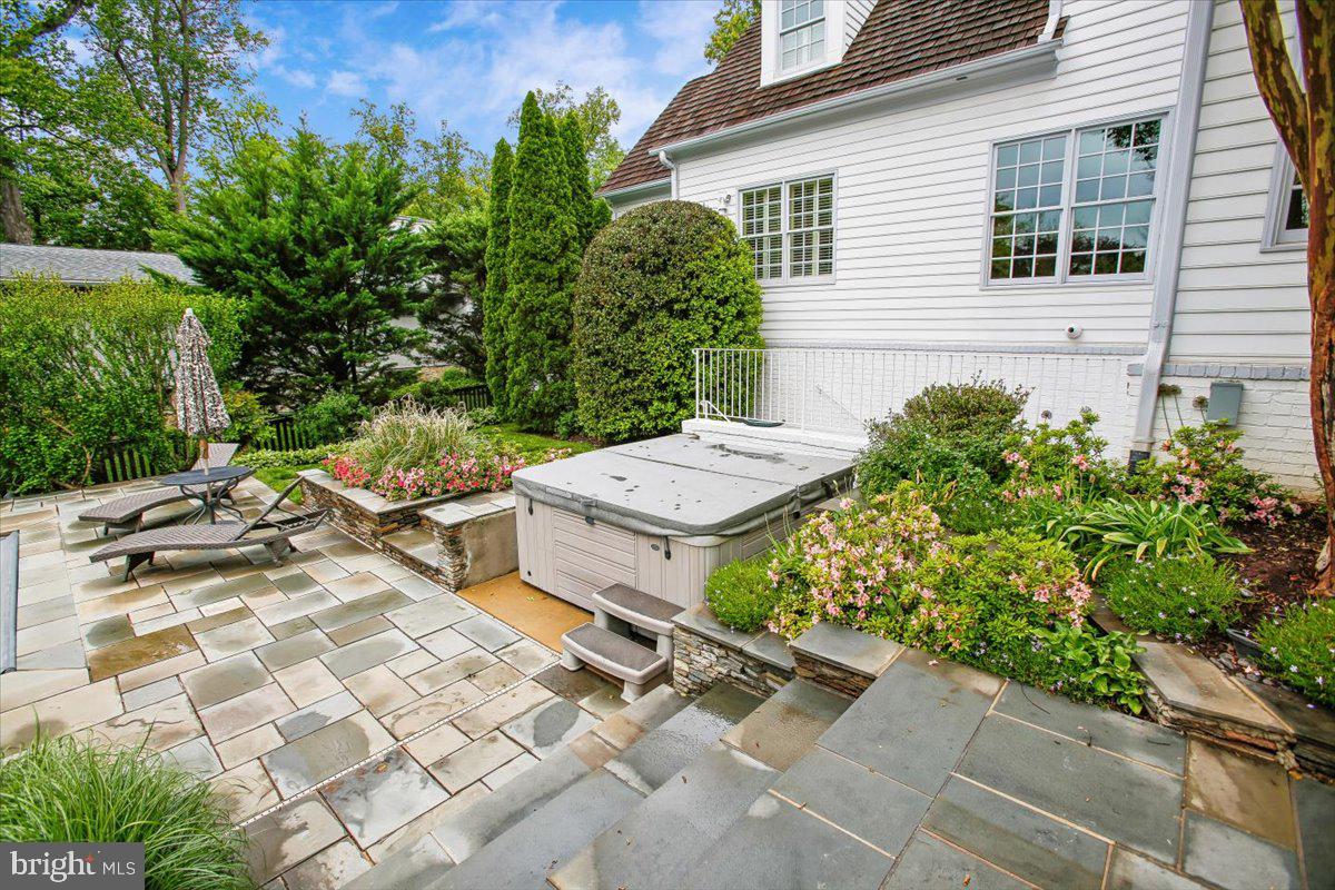 6809 Sorrel Street McLean, VA 22101 - Photo 82 of 101 a view of a backyard with chairs and potted plants