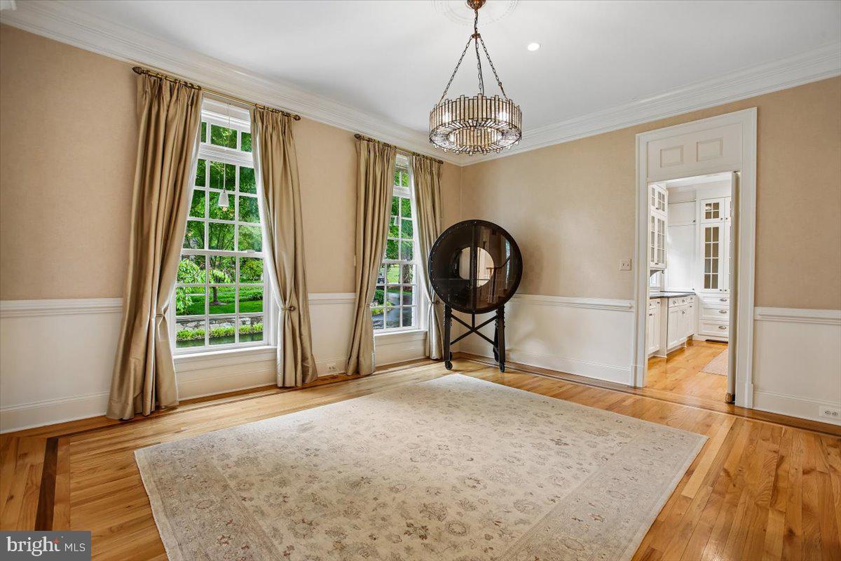 6809 Sorrel Street McLean, VA 22101 - Photo 9 of 101 a view of a livingroom with a chandelier and wooden floor
