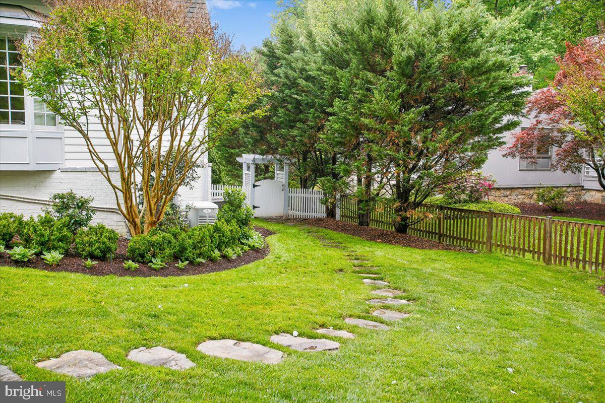 6809 Sorrel Street McLean, VA 22101 - Photo 91 of 101 a view of yard with swimming pool and green space