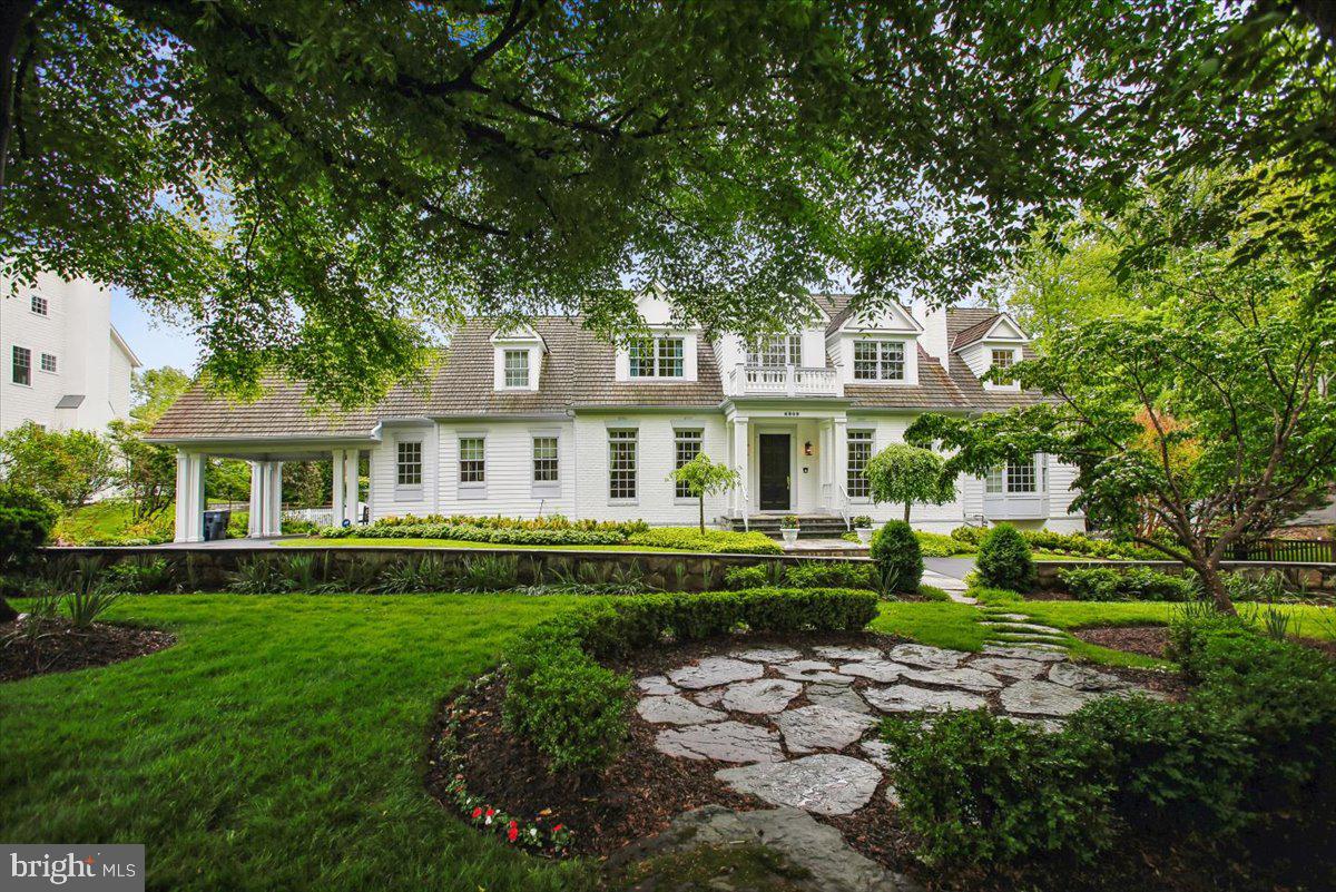 6809 Sorrel Street McLean, VA 22101 - Photo 92 of 101 a front view of a house with a garden