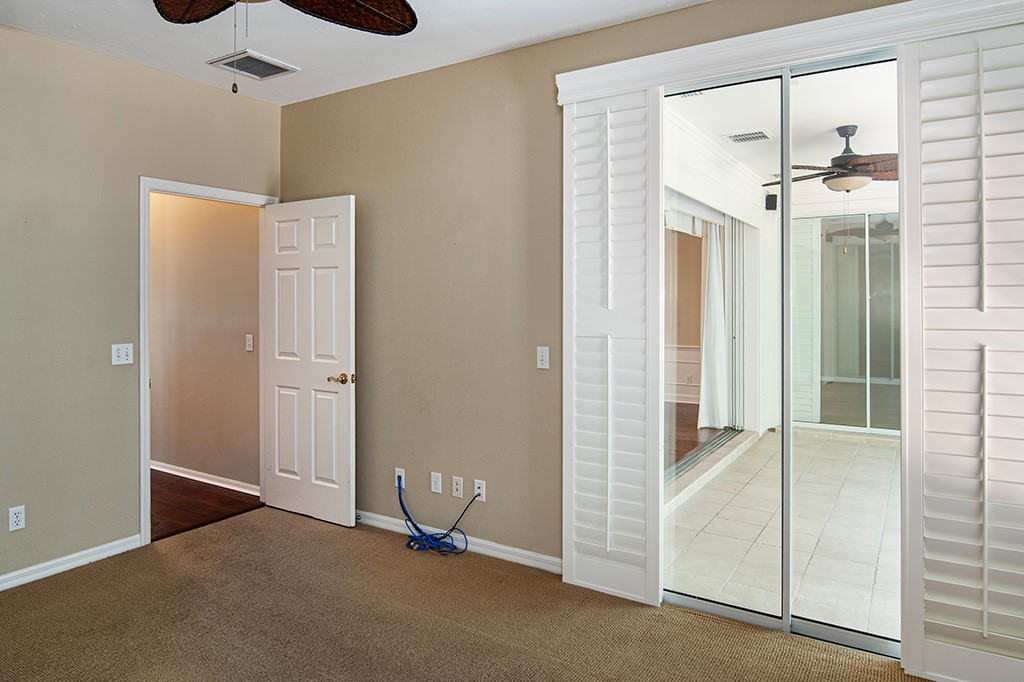 710 Timber Ridge Trail Southwest Vero Beach, FL 32962 - Photo 14 of 35 a view of a room with a chandelier