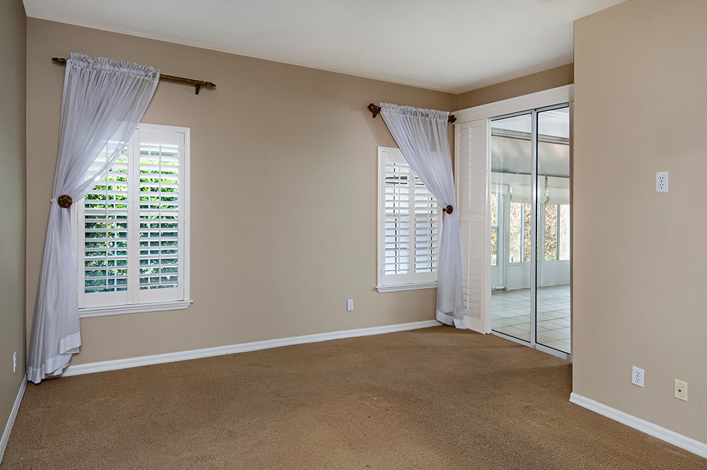 710 Timber Ridge Trail Southwest Vero Beach, FL 32962 - Photo 16 of 35 a view of an empty room with a window