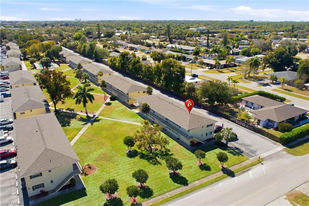 3325 Airport Road North, Unit S8 Naples, FL 34105 - Photo 25 of 33 an aerial view of residential houses with outdoor space