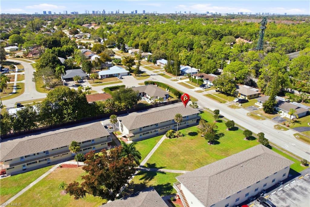 3325 Airport Road North, Unit S8 Naples, FL 34105 - Photo 29 of 33 an aerial view of residential houses with outdoor space