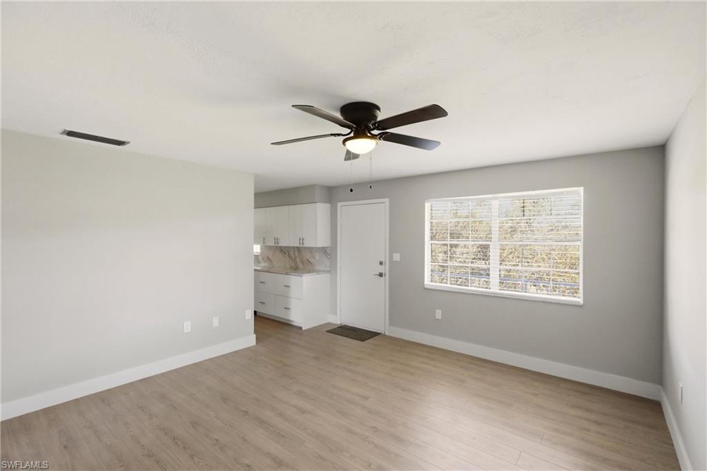 3325 Airport Road North, Unit S8 Naples, FL 34105 - Photo 6 of 33 a view of an empty room with a window