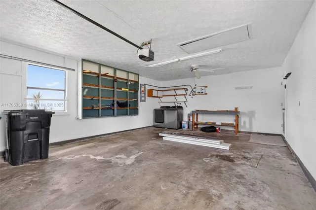a view of a livingroom with furniture and a fireplace