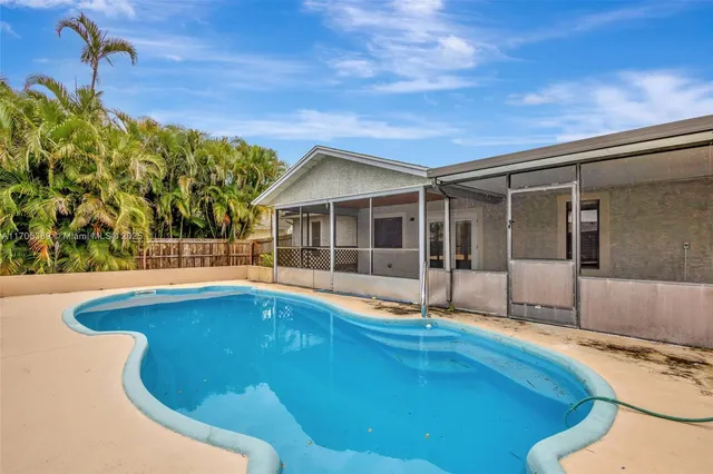 a view of outdoor space yard swimming pool and porch