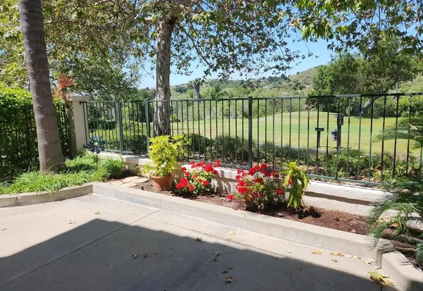 a garden view with a seating space