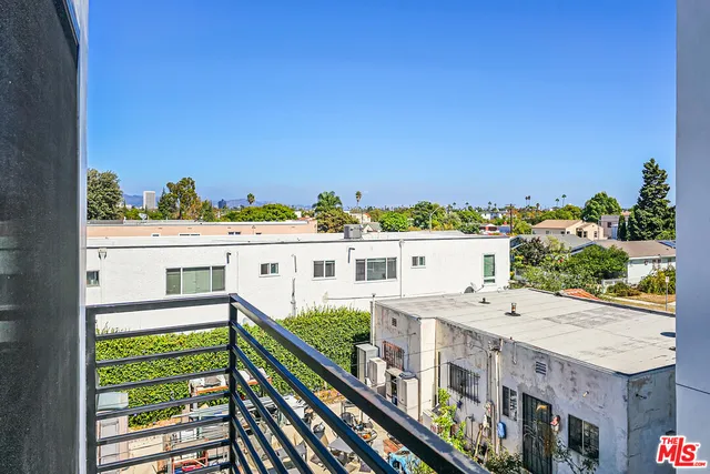a view of a balcony with an outdoor space