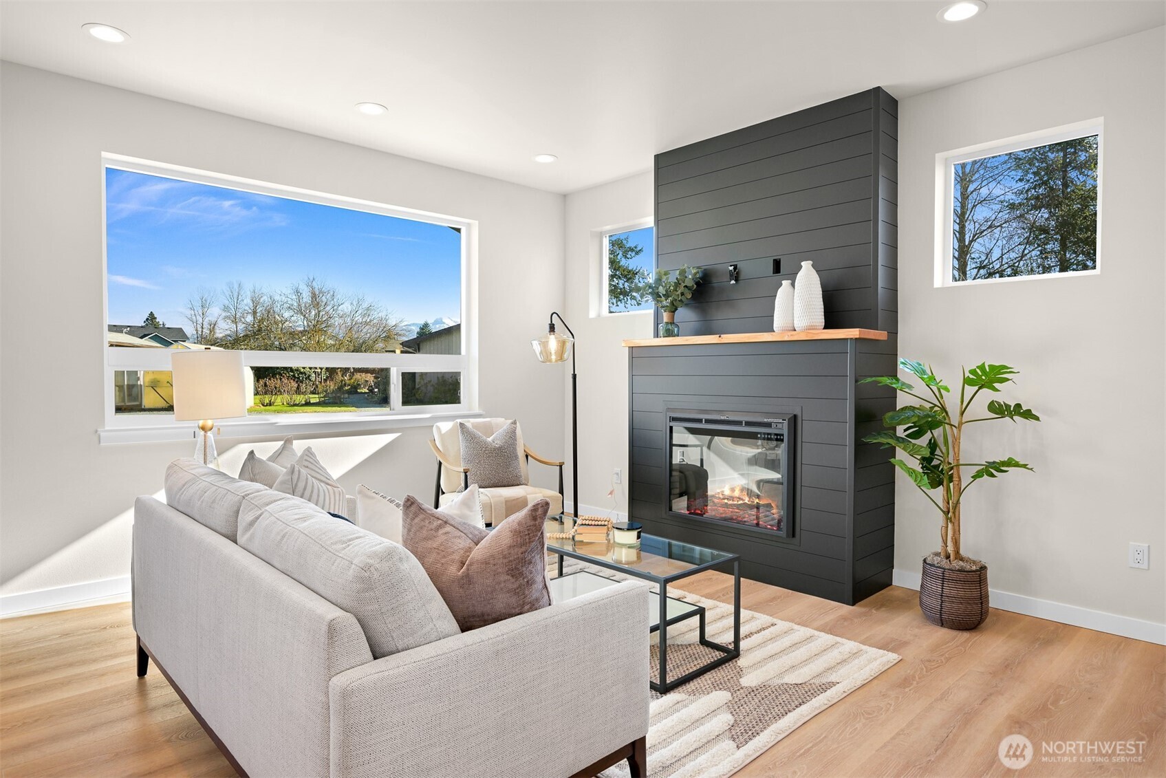 710 A F & S Grade Road, Unit B Sedro-Woolley, WA 98284 - Photo 13 of 38 a living room with furniture and a fireplace