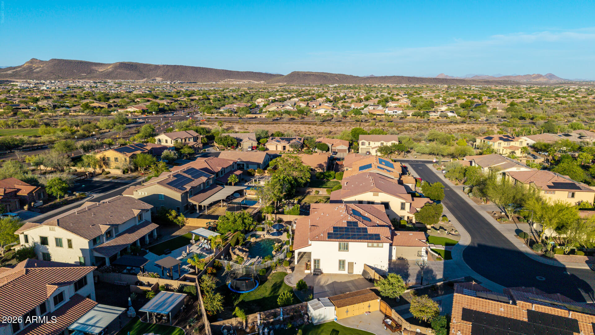 13058 West Lowden Road Peoria, AZ 85383 - Photo 108 of 122 an aerial view of residential houses with city view