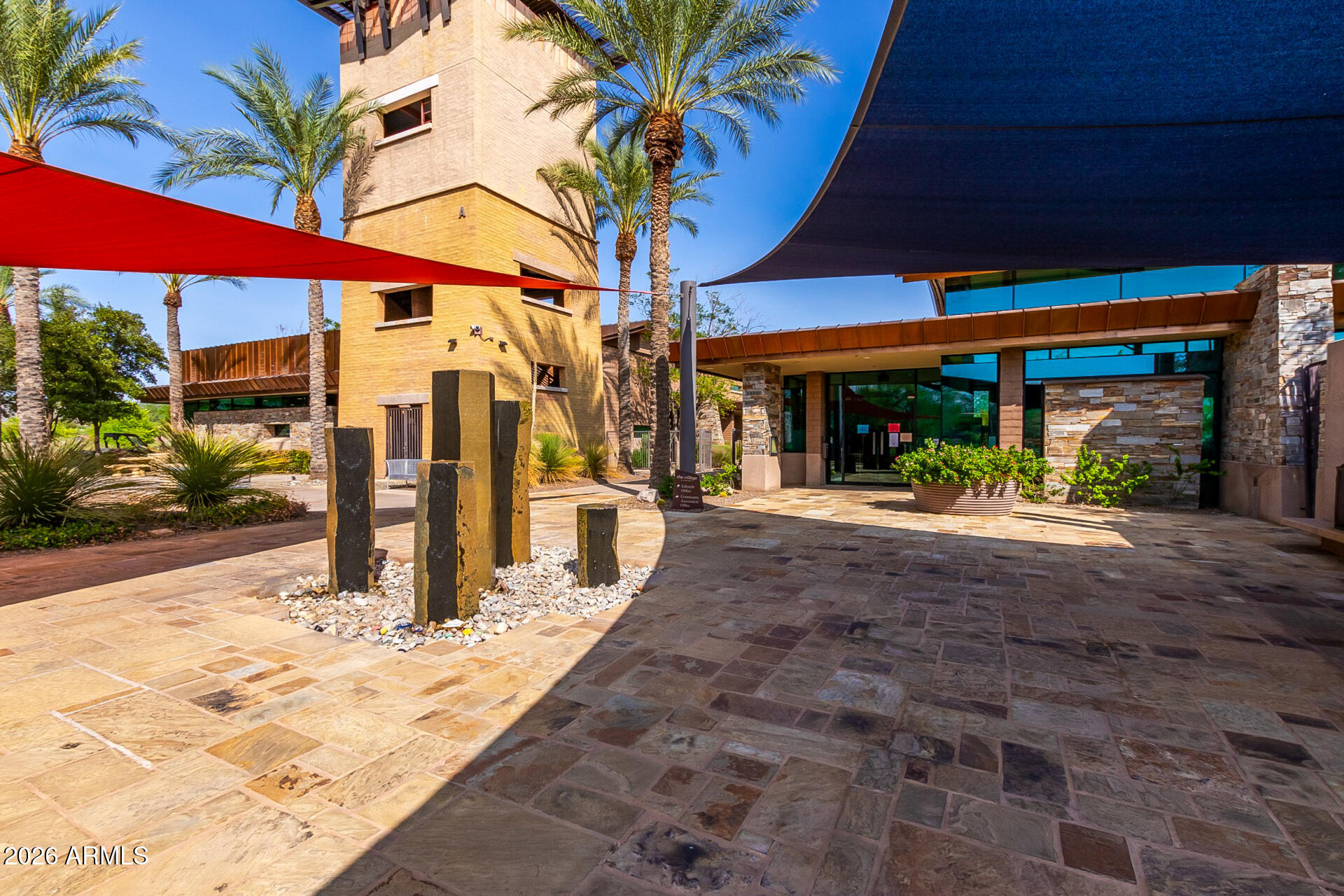 13058 West Lowden Road Peoria, AZ 85383 - Photo 115 of 122 a view of a building with a patio