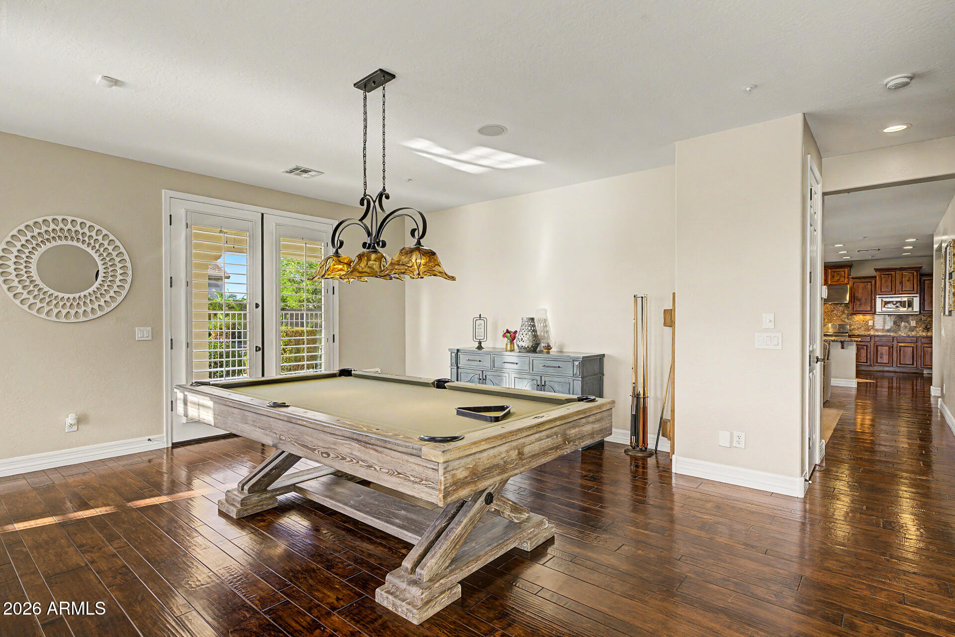 13058 West Lowden Road Peoria, AZ 85383 - Photo 39 of 122 a living room with dining table