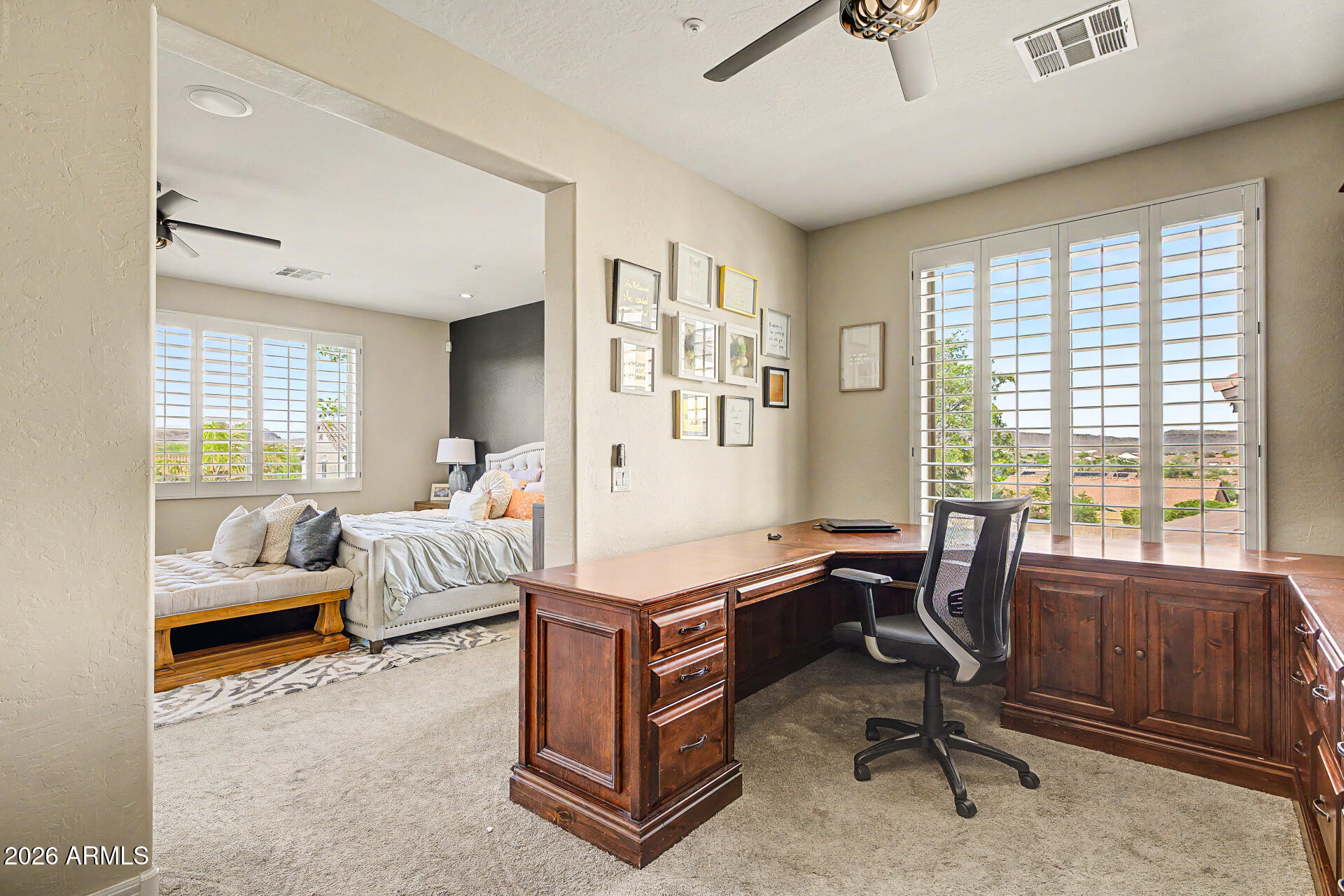 13058 West Lowden Road Peoria, AZ 85383 - Photo 55 of 122 a view of a livingroom with workspace and a window