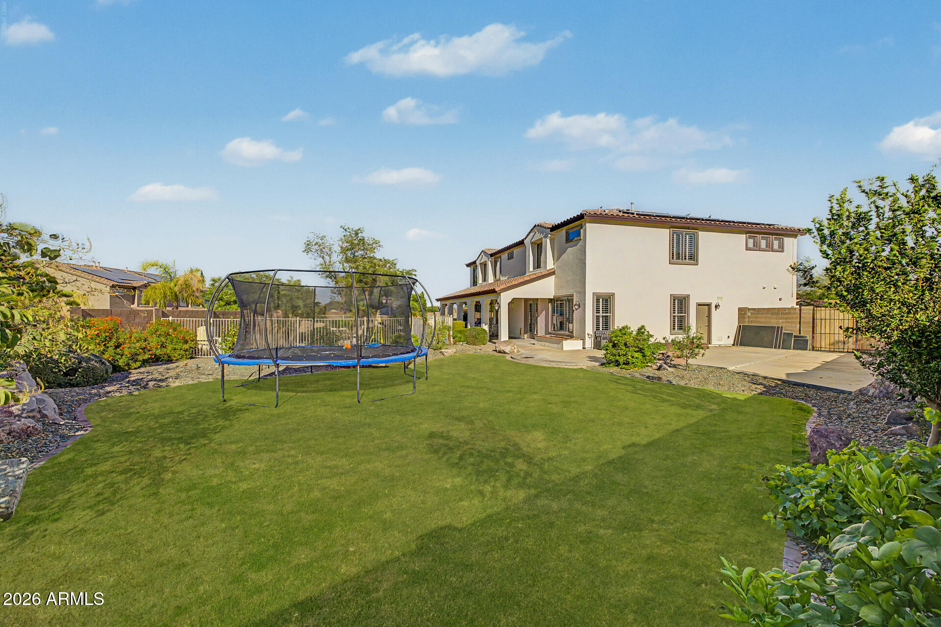 13058 West Lowden Road Peoria, AZ 85383 - Photo 95 of 122 a view of a house with a yard