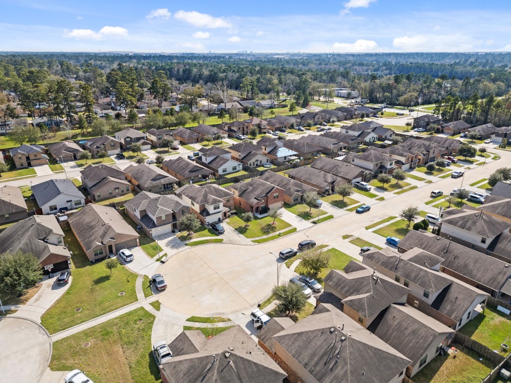 2034 Harmon Park Court Spring, TX 77373 - Photo 31 of 31 an aerial view of residential houses with outdoor space