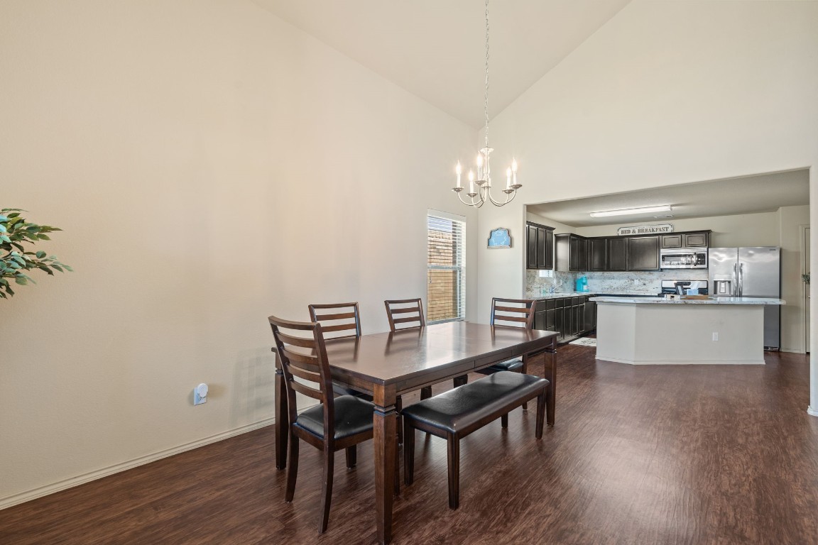 2034 Harmon Park Court Spring, TX 77373 - Photo 4 of 31 a view of a dining room with furniture and wooden floor