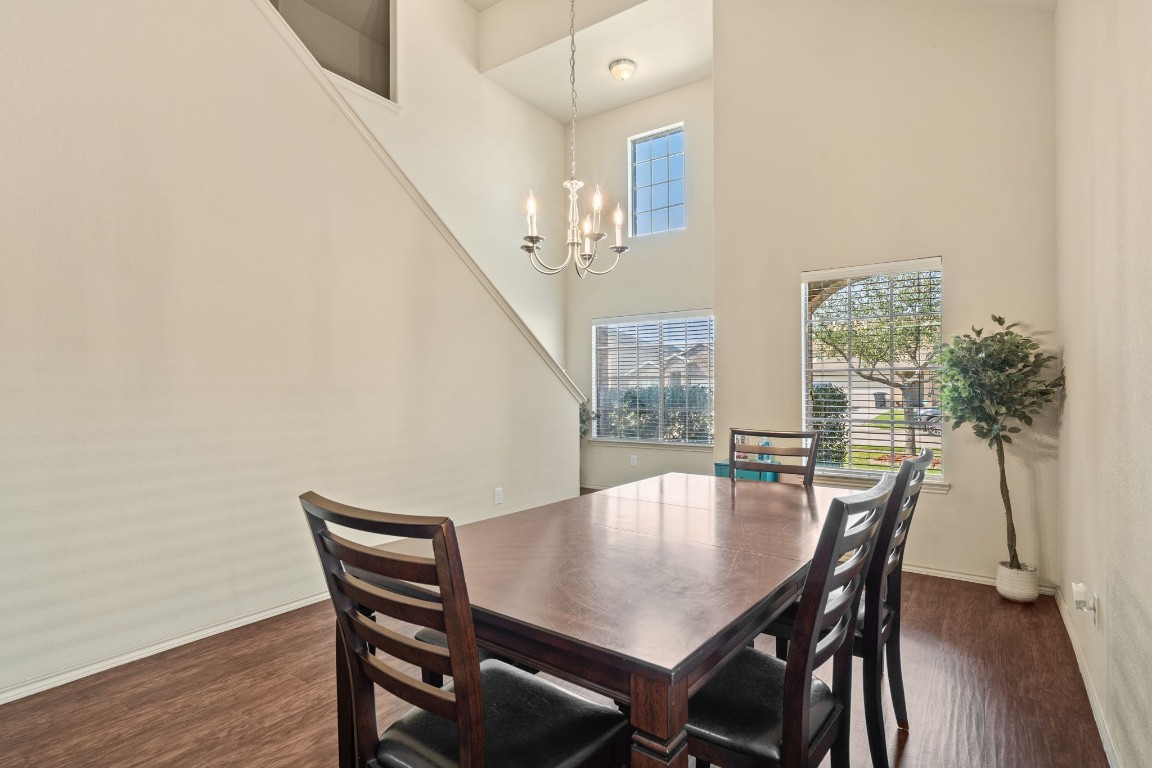 2034 Harmon Park Court Spring, TX 77373 - Photo 5 of 31 a view of a dining room with furniture and wooden floor