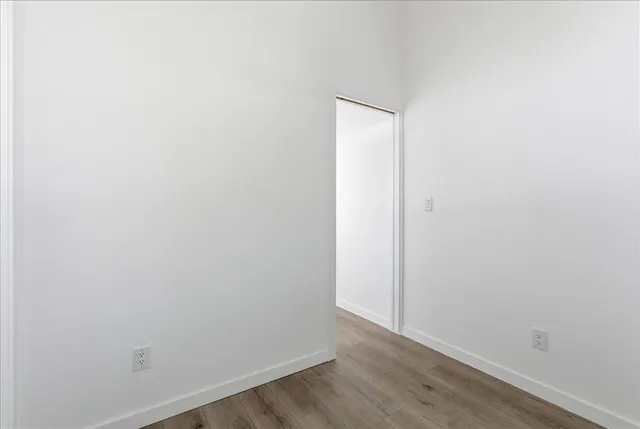 a view of small space with wooden floor